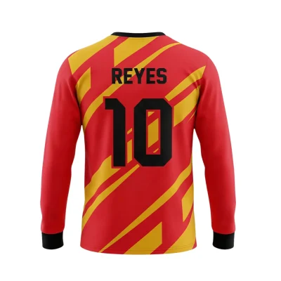 Soccer player wearing long sleeve jersey with folded stitch cuffs and round neck during cool weather training