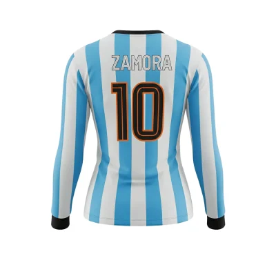 Soccer player wearing long sleeve birdseye mesh jersey demonstrating breathability during warm weather match