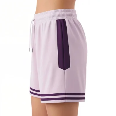 Female athlete wearing 2-inch inseam 150 Interlock basketball shorts Caption: The BKB-02-INT features a 2-inch inseam and premium 150 Interlock fabric for ultimate comfort, ventilation, and mobility.