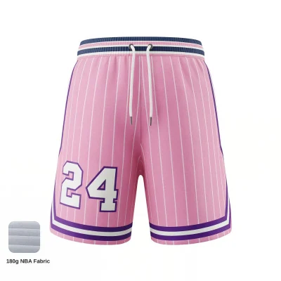 Female basketball player wearing 2-inch inseam pro-style NBA fabric shorts.