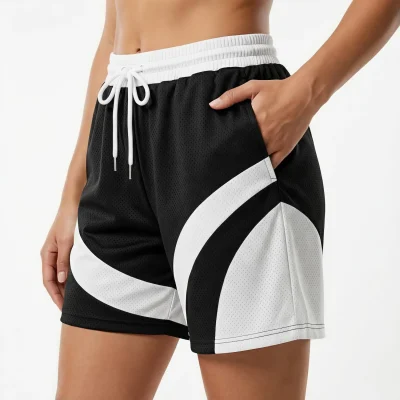 Array of women's basketball shorts in different fabrics (jacquard, mesh, interlock) showing the 2-inch shorter length and pocket detail.