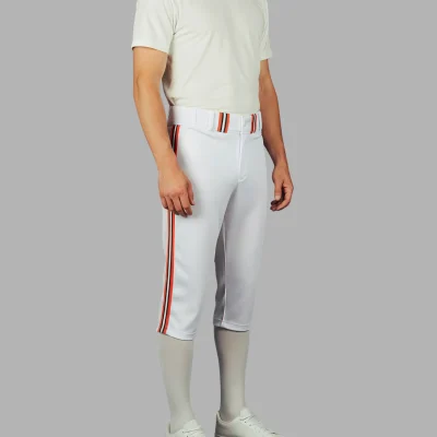 A pair of modern cropped baseball pants with vibrant, all-over sublimated team graphics, made from stretchy spandex interlock fabric.