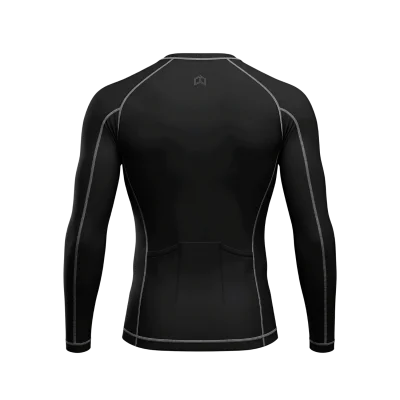 Athlete in a tight black long sleeve compression base layer jersey