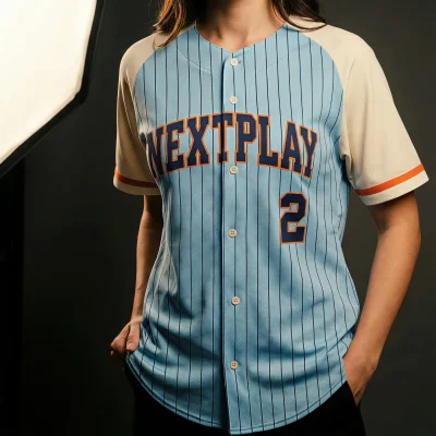 A women's full-button baseball jersey custom sublimated with team graphics on breathable 160G Birdseye Mesh fabric.