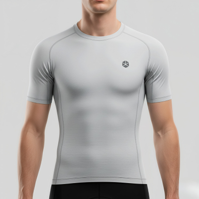 A solid color tight-fitting short sleeve compression shirt made from advanced cooling fabric, ideal as an athletic base layer.