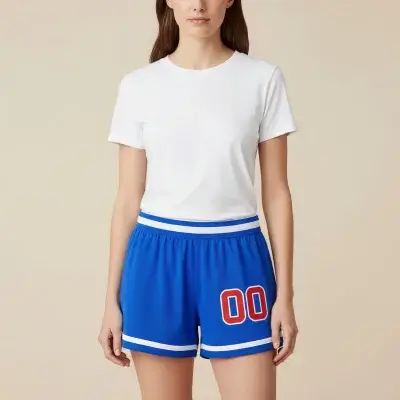 Women's basketball team wearing custom printed reversible shorts during practice