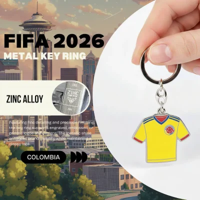 Colombia national football team FIFA 2026 metal key ring, zinc alloy jersey-shaped key chain with Colombian Football Federation crest, yellow soccer jersey design, fine detailing and precision finishing, metallic shine, classy look, FIFA 2026 World Cup fan accessory