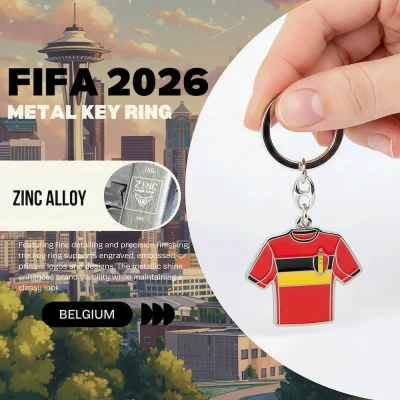 Belgium national football team FIFA 2026 metal key ring, zinc alloy jersey-shaped key chain with Belgian national crest, red-yellow striped soccer jersey design, fine detailing and precision finishing, metallic shine, classy look, FIFA 2026 World Cup fan accessory