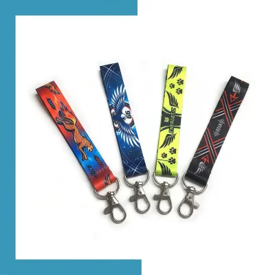 Full-color dye sublimation printed polyester wrist lanyard with edge-to-edge geometric pattern and lobster claw.