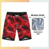 Custom full sublimation printed 160gsm birdseye mesh performance shorts for unisex laid flat, showcasing vibrant design on breathable textured fabric with elastic waistband and drawcord