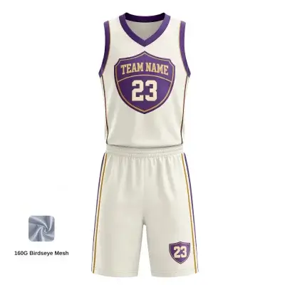 Custom full sublimation printed v-neck basketball uniform kit laid flat, showcasing vibrant design on birdseye mesh fabric with matching jersey and shorts