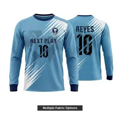 Custom full sublimation long sleeve soccer jersey laid flat, showcasing vibrant edge-to-edge design on premium performance fabric with long sleeves